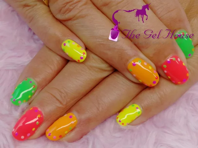 Bright orange, pink and yellow gel nail art by Tammy